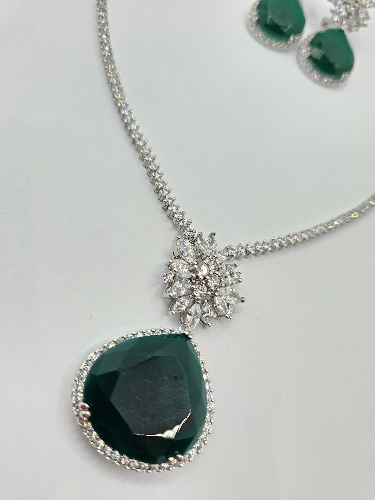 Subtle Radiance: Emerald & Sapphire Set